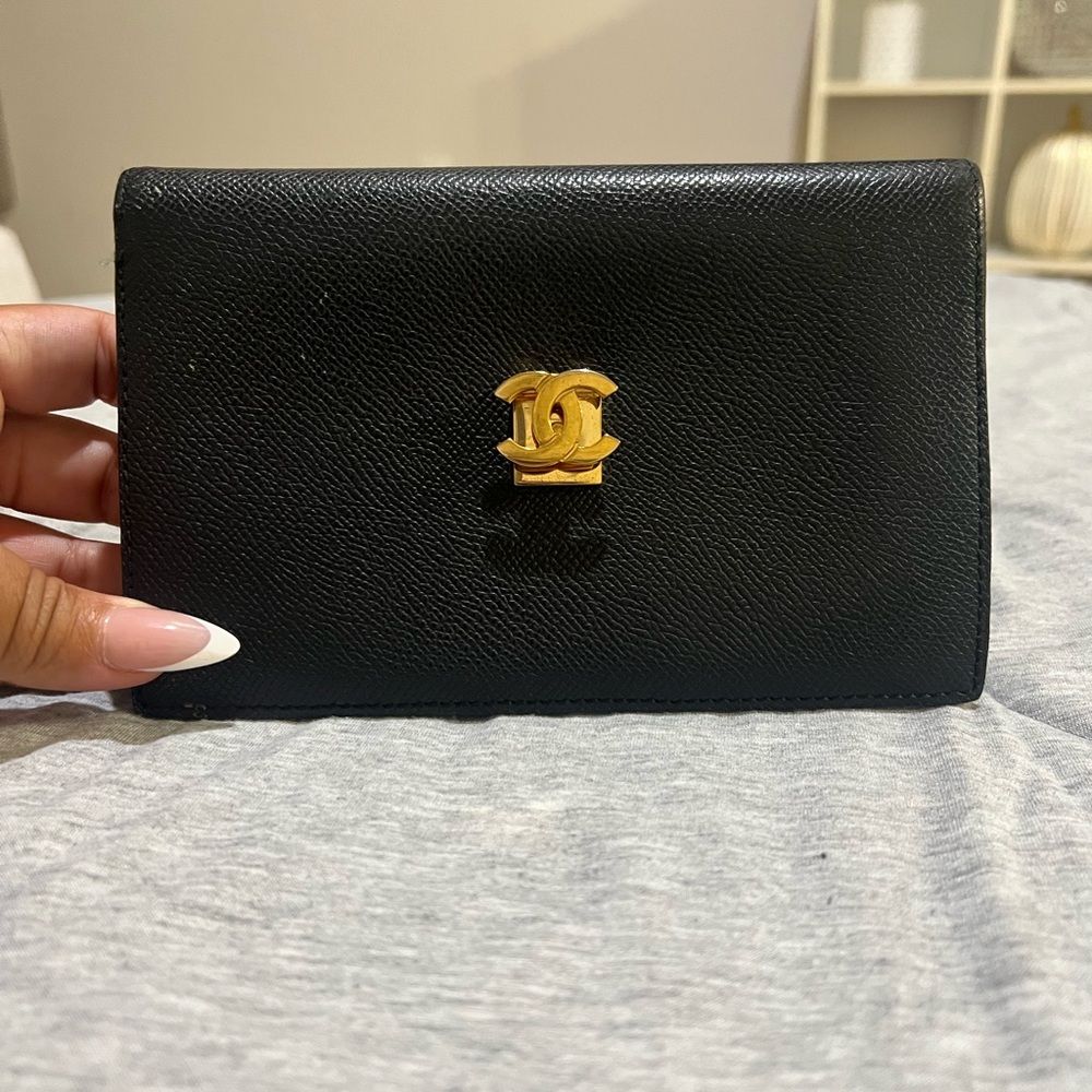 CHANEL Black Wallet with Gold Emblem